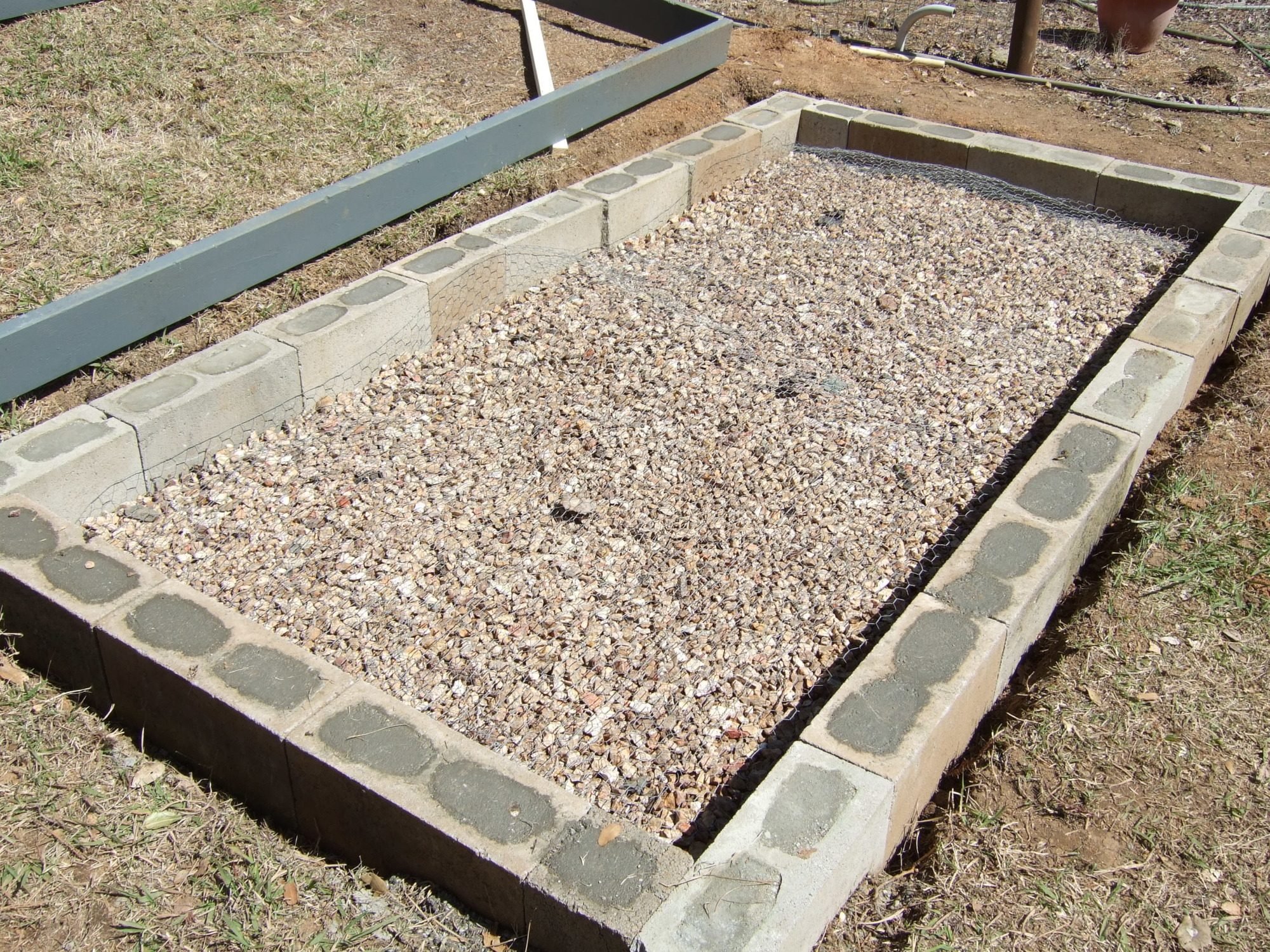 little fill sand, some rocks, some chicken wire, some more chicken ...