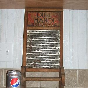 Dubl Handi washboard towel rack
has a little rust, but I think that makes it look better (o:
(looks odd, sorry.  It's between the counter and the bottom of the cabinets)
