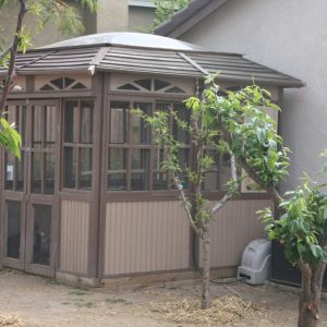 The Large Gazebo Coop.  I salvaged an old spa gazebo and turned it into a nice walk-in chicken coop.