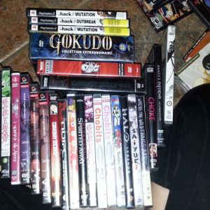 Big stack of anime dvds and PS2 videos games
$1 each or $35 for everything. 
This pic does not have all the items in it --- its a pretty big list