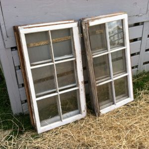 Reuse double hung windows by separating them and using them individually on their sides. Cost $0.00