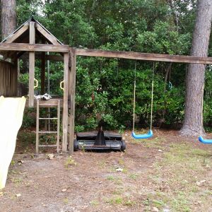 Before: your standard, wooden playhouse/swingset