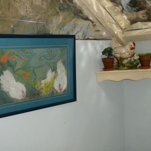 Even chickens appreciate artwork on the  walls and indoor plants. Don't they?