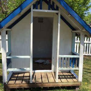 an old playhouse turned to chicken coop