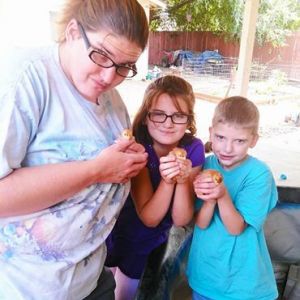 Wife and kids holding baby chicks purchased chicks 9/7/15 at local pet store Whities