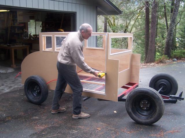  assembly of side panels to front and placement on trailer frame