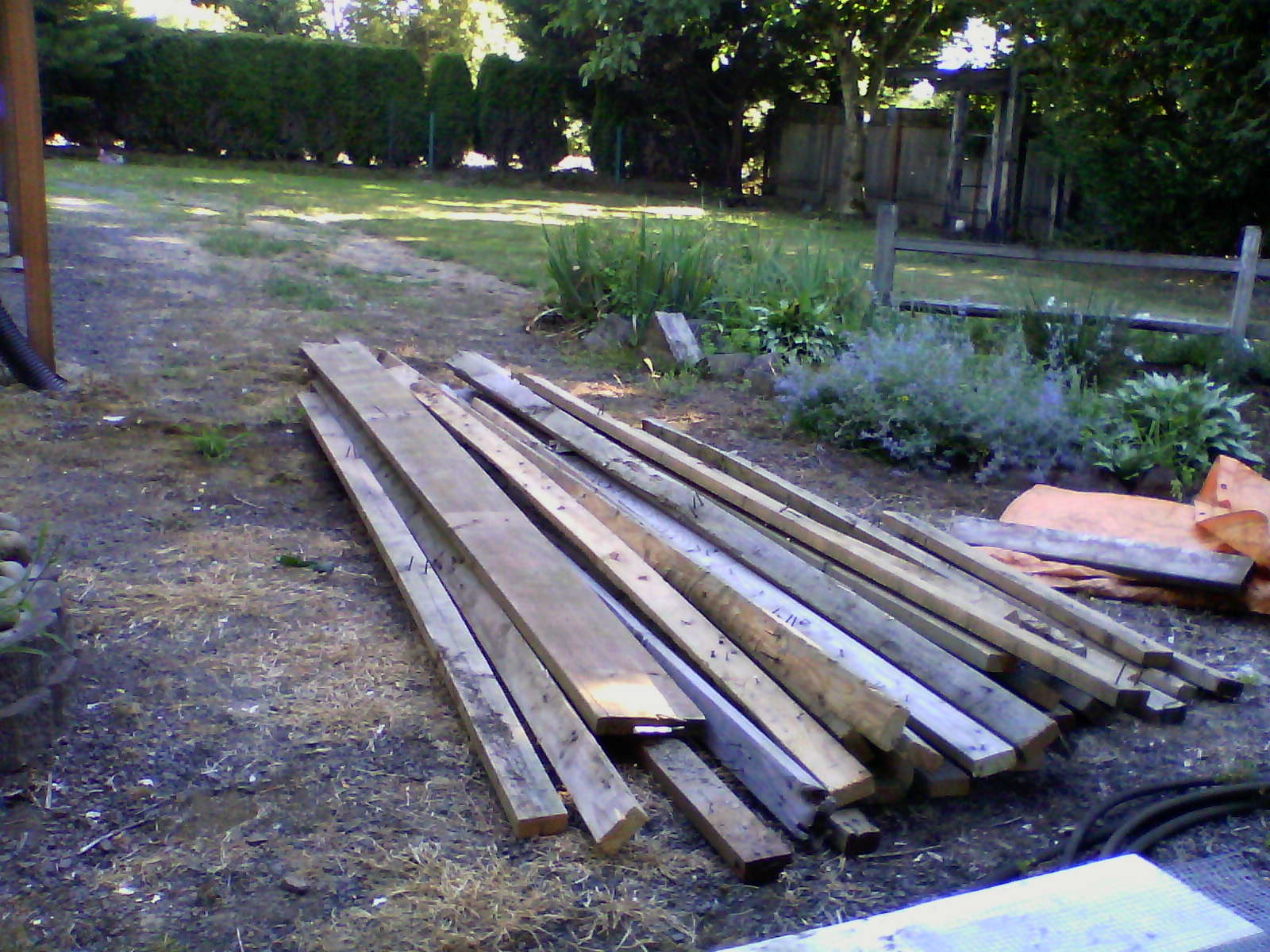 August 2014: Can you see it? This is the beginning of my DIY coop. Free lumber! 
But......I do have to deal with a whole lot of nails.