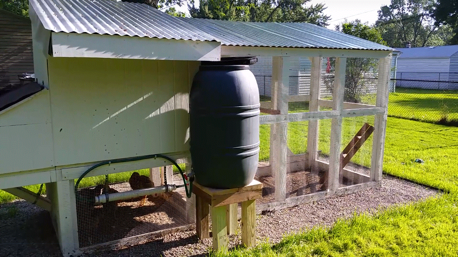 Chicken watering system with 25 watt heater and a 5 watt fish pump in the bottom