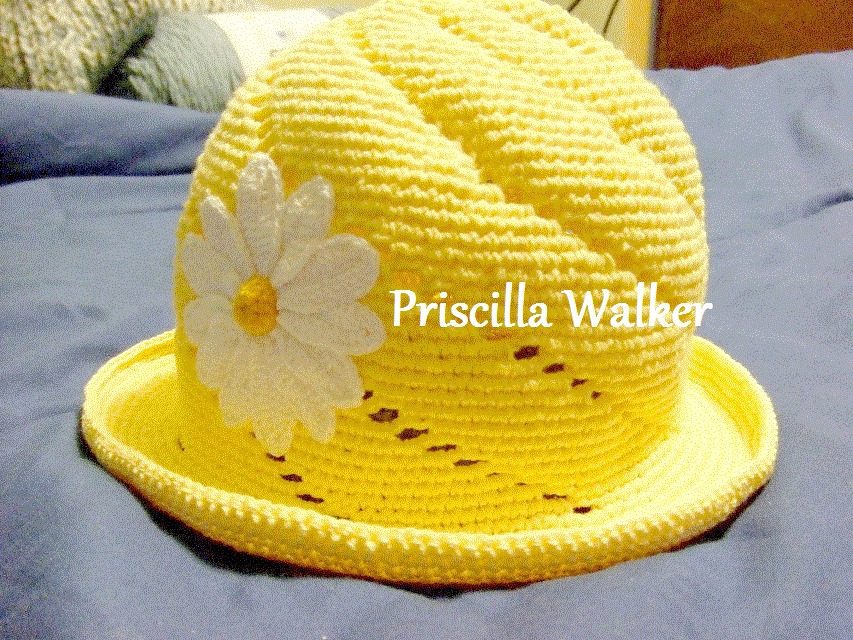I enjoyed making this. It's a remake of an old bedspread motif. I decided it looked better as a hat.