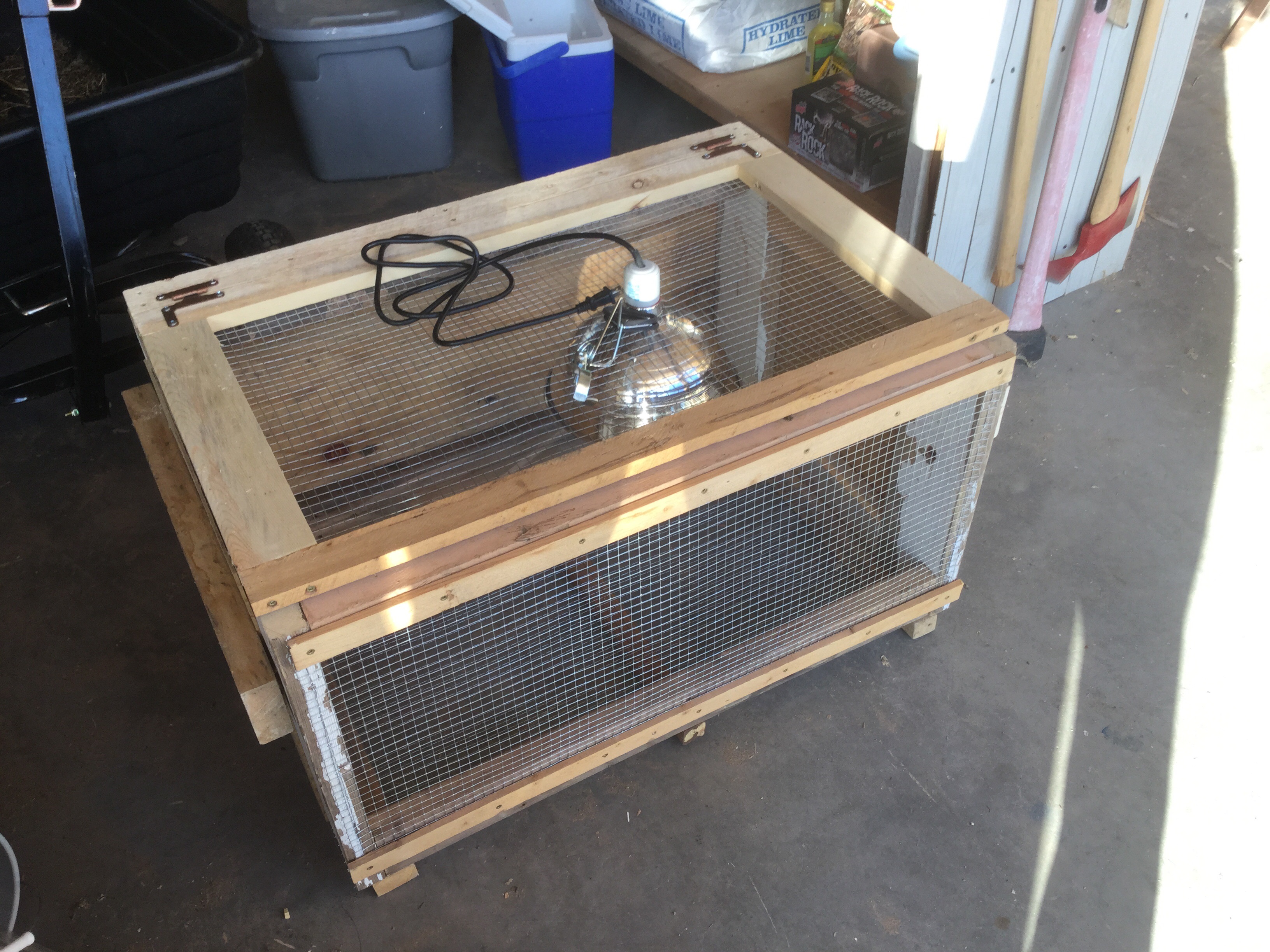 Just a quick brooder box I built out of some recycled materials I had laying around the shop, the only thing missing is the thermometer. The light is adjustable using the clamp that came with it.