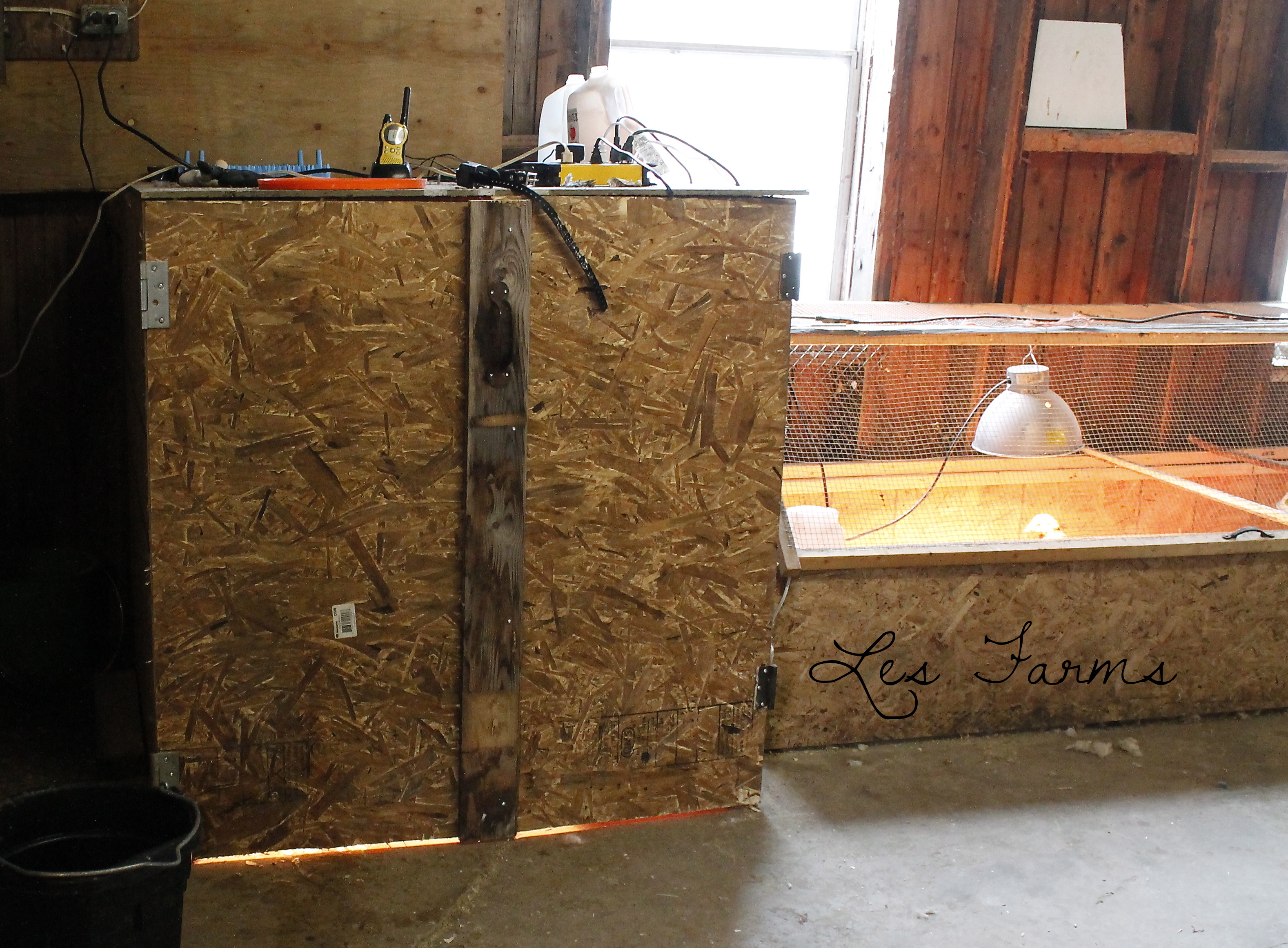 My heated FF closet in the barn. I did not want to lug down buckets of feed from the house every morning in winter. My solution was to create a heated place in the barn where it would keep it cooking, and prevent it from freezing. This closet stays 75F in temps outside @ -20F