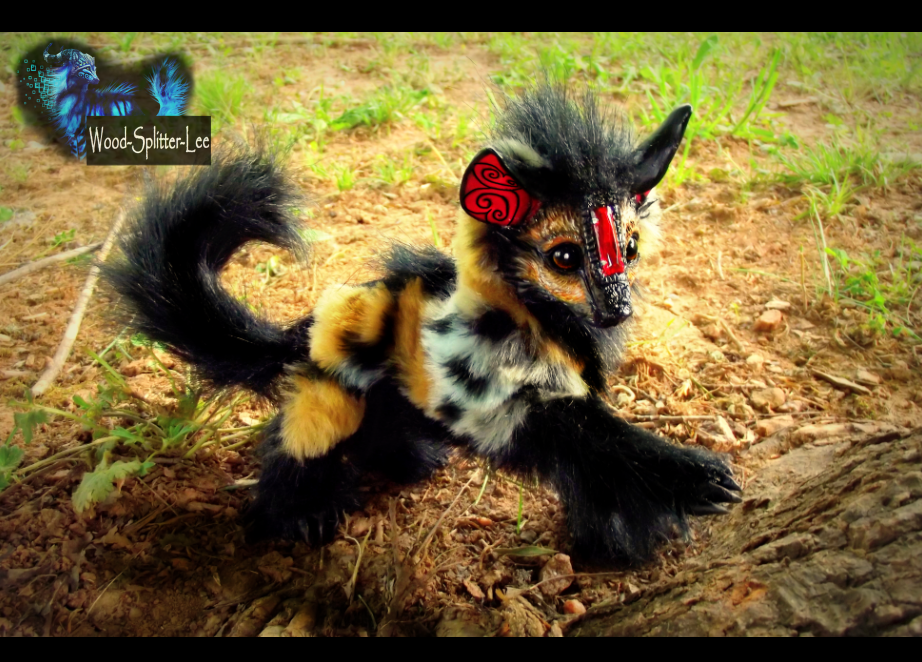 __sold__poseable_fully_hand_made_baby_hyena__by_wood_splitter_lee-d634idt.png