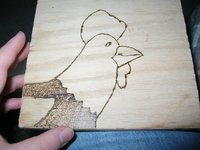 THE ANGRY HEN'S WOODBURNED ROOSTER.jpg
