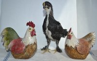 Trois chicken statues.jpg
