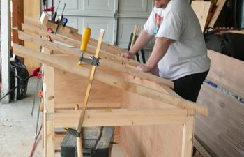 Coop-roofgoingon.jpg