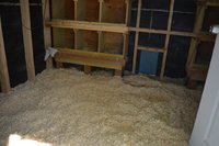 coop floor with shavings small.jpg