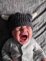 Alice crying in hat.jpg