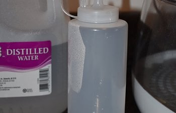 Condiment Water Bottle for Incubator.JPG