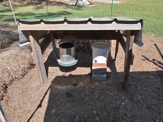 An Outdoor Shelter For the Feeder and Waterer