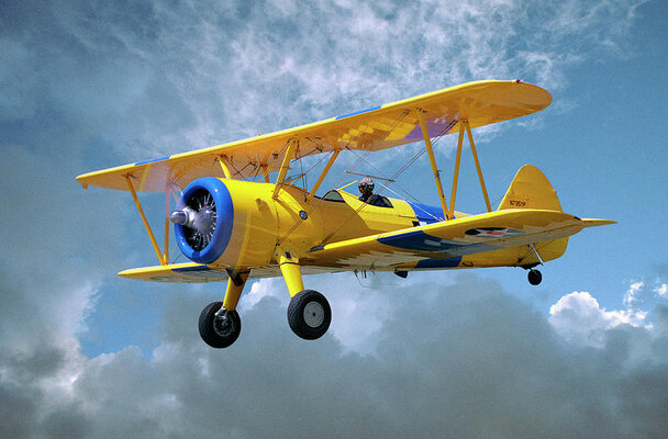 yellow-stearman-5yp-bi-plane-flying-in-diane-miller.jpg