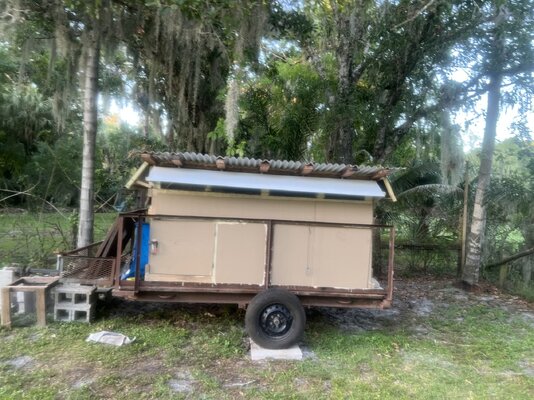 Awnings attached with moveable wood prop.jpg