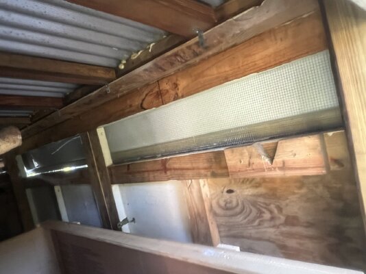 inside coop with awings closed.jpg
