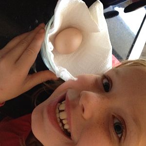 Our first egg, courtesy of the Gold Laced Wyandotte.