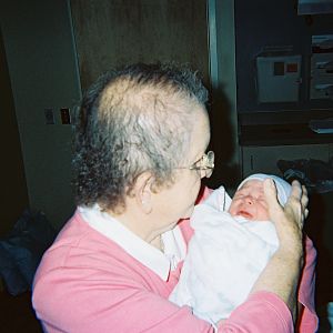 Great Grandma gets to hold him first
