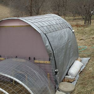Coop cover with wind fly, tarp and tension stays -
PEX reinforcement watering section