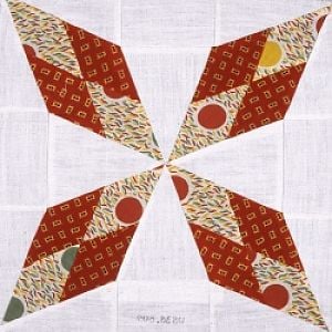 This is a quilt block called Cowboy Star. I found this pic on a museum website when I couldn't find the block pattern.