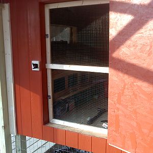 I framed in coated 1/2 inch hardware cloth for the screen door.
