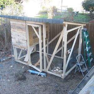 The coop, about half finished.  My 3 grown sons gave me this as a Christmas present....a surprise!  This is for 5 chickens.