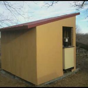 siding all up and 1st coat of paint