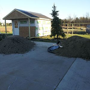 sand and gravel for the run,  dont want it to flood