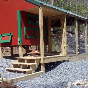 Hardware cloth installed, backfilled, stone down and electric fence is on.