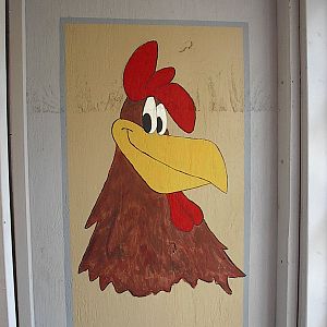 the only rooster , painted on interior wall.