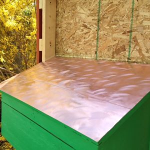 Nesting box roof, pure copper that Karen swirled with an orbital sander.