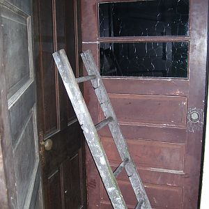 we have replaced the ladder with a different perch that goes across the entire rear of the coop...more pics later...we house 1 cockrel and 4 pullets in this coop :)