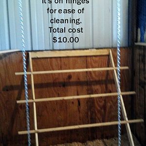 My husband Joe built me a new roost for my peeps.  It's on hinges for ease of cleaning.  The runs are 12" apart and each run is about an inch and a half wide. 4' tall and 3' wide. The runs are notched into the wood, glued and nailed.  The cost was very low, just $10.00