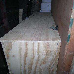 the nest box door.... he still needed to stain it and add the handles and latches