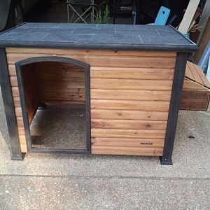 The beginning of my "dog house to coop"conversion. First modification-the nesting box made out of a vintage box