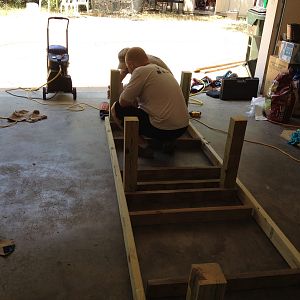 Dad and hubby building the bottom frame--10'long!!