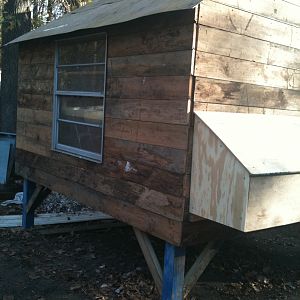 Coop with finished roofing and nestboxes.