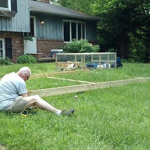 With our first small chicken tractor in the background housing 3 week chicks, we got to work on the second tractor, this one is 8'x16' and will have a hoop top.