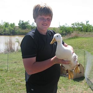 My oldest with one of his ducks