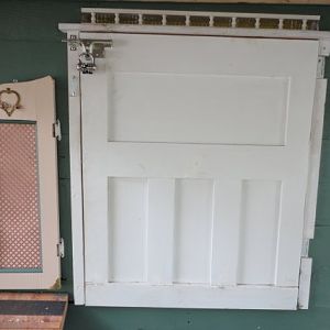 Pop door and clean out door - painting in progress