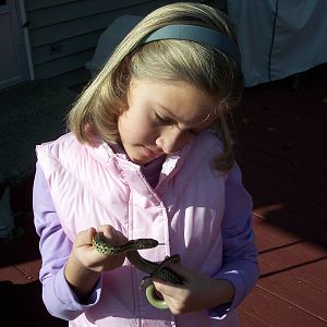 me as a little kid with a garter snake I caught lol