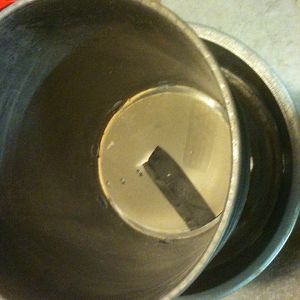 Plastic cone in bottom of bucket
