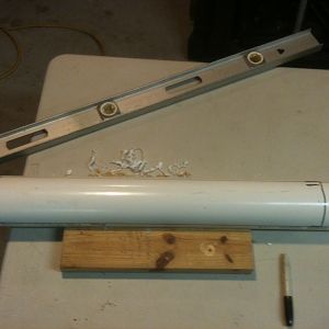 5. Mark out for your cut-out. (about 1/3 of the circumference of the pipe) leaving 2 or 3 inches on each end intact.