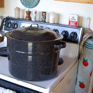 I didn't have an outdoor stove, so I used an indoor stove and a huge scald pot. I used a cheese thermometer to check the water and make sure the scald was not too hot.